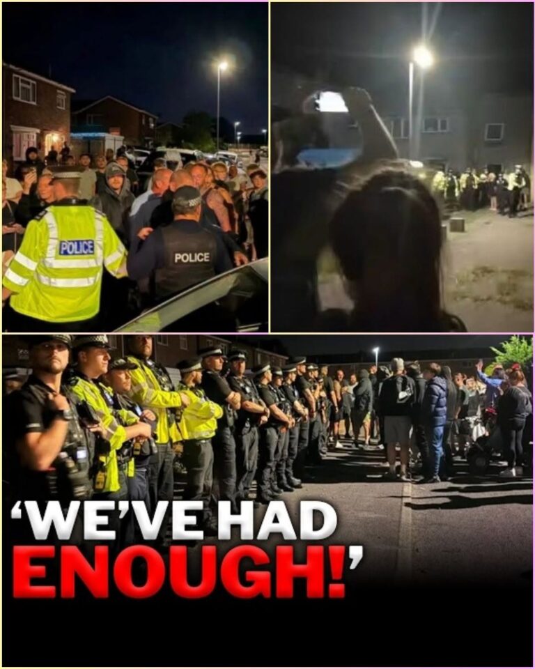 CHAOS IN NORFOLK: Standoff Escalates Outside Asylum Housing! Angry crowds gathered at St. John’s Way demanding the immediate removal of migrants, accusing leaders of betrayal! As tensions boiled over, police formed human shields to protect the complex—until a sudden evacuation plan was leaked… Just as officers moved to secure the building, a shocking action targeted a female officer, forcing riot units to make a split-second decision